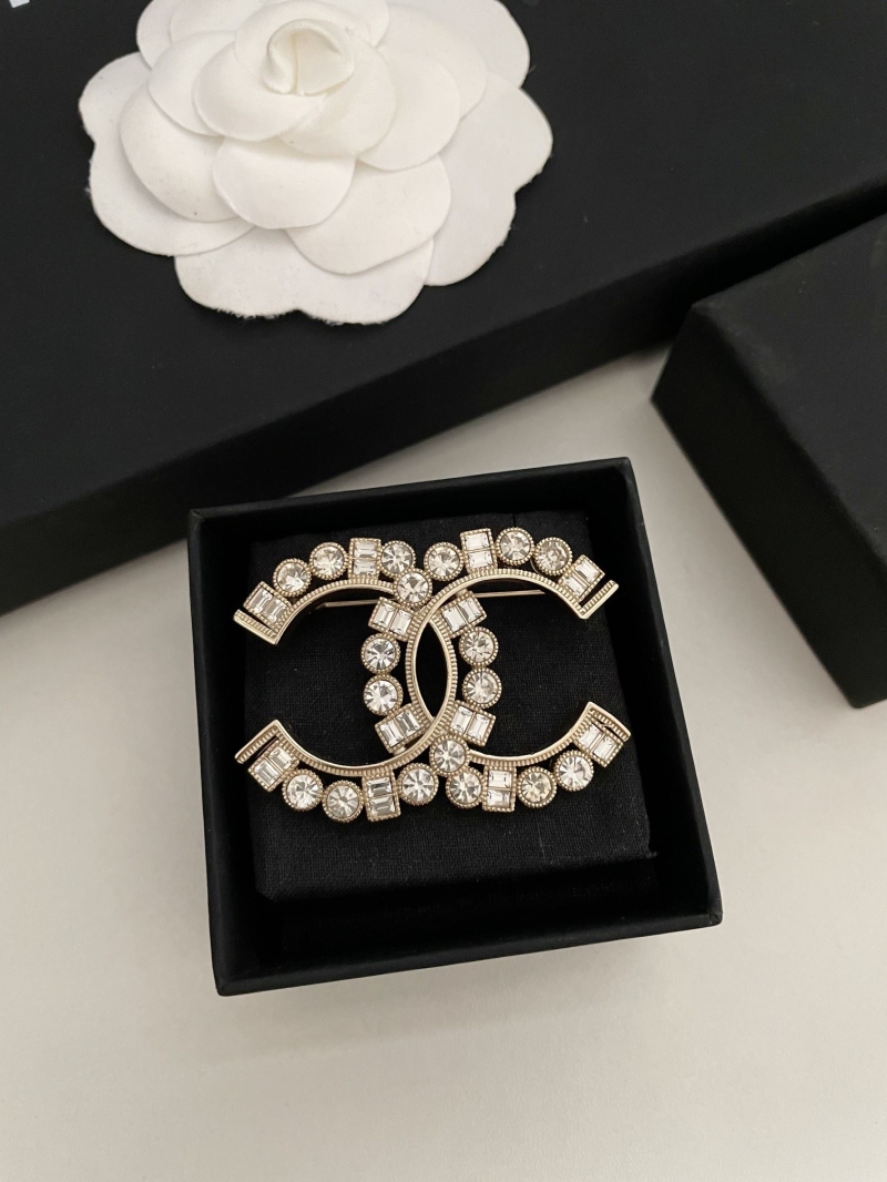 Ch**el brooches